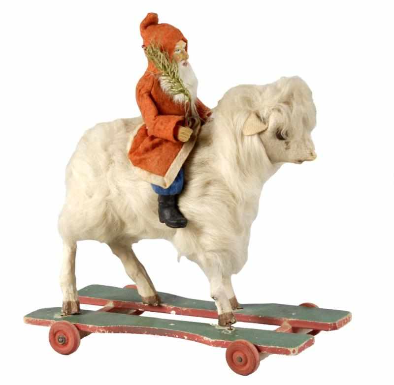 Appraisal: Large Santa Riding a White Goat Pull Toy Description Goat