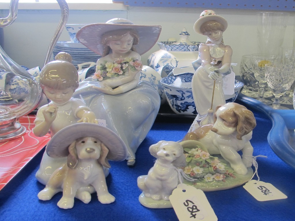 Appraisal: Five Lladro figures including 'It Wasn't Me' 'Fragrant Bouquet' and