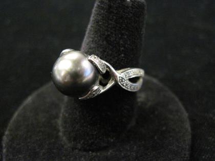 Appraisal: karat white gold diamond and Tahitian pearl ring mm black