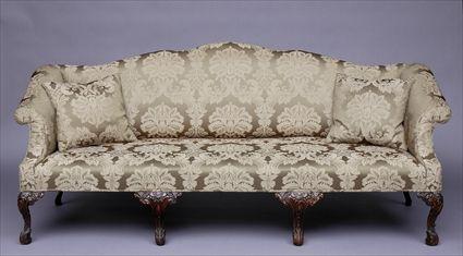 Appraisal: CONTINENTAL ROCOCO SETTEE The serpentine cresting rail above an upholstered