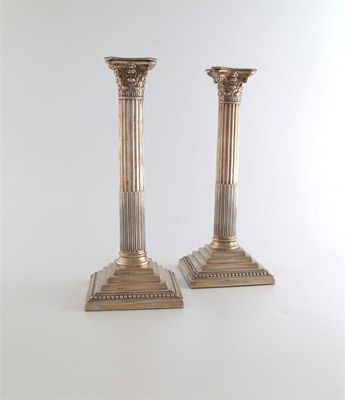 Appraisal: A pair of silver candlesticks by William Hutton and Sons