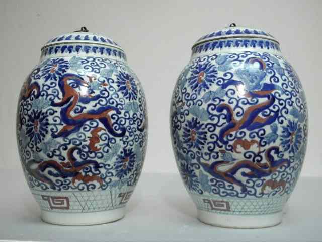 Appraisal: Pair Chinese ceramic iron-red and blue decorated ginger jars Stylized