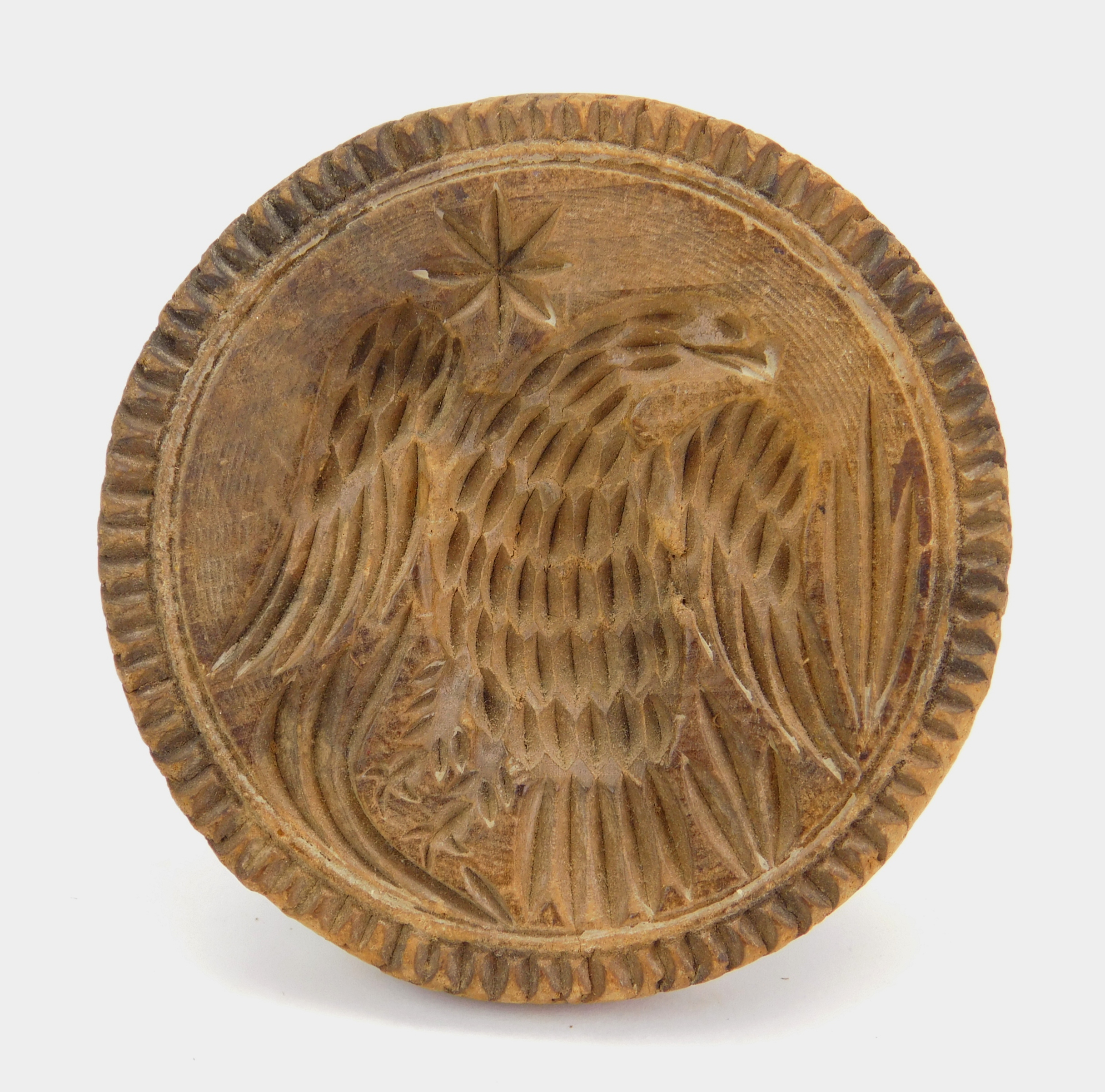 Appraisal: Hand carved butter mold Eagle with carved edge '' dia