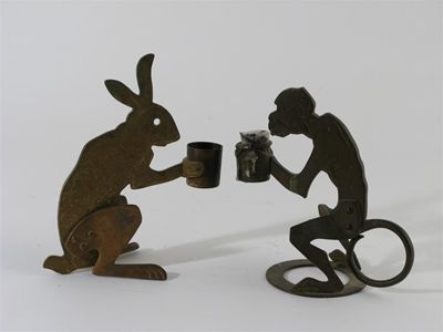 Appraisal: A pair of brass novelty candlesticks modelled as a rabbit