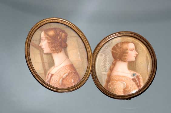 Appraisal: TWO PAINTED IVORY MINIATURES Two painted ivory miniature oval plaques