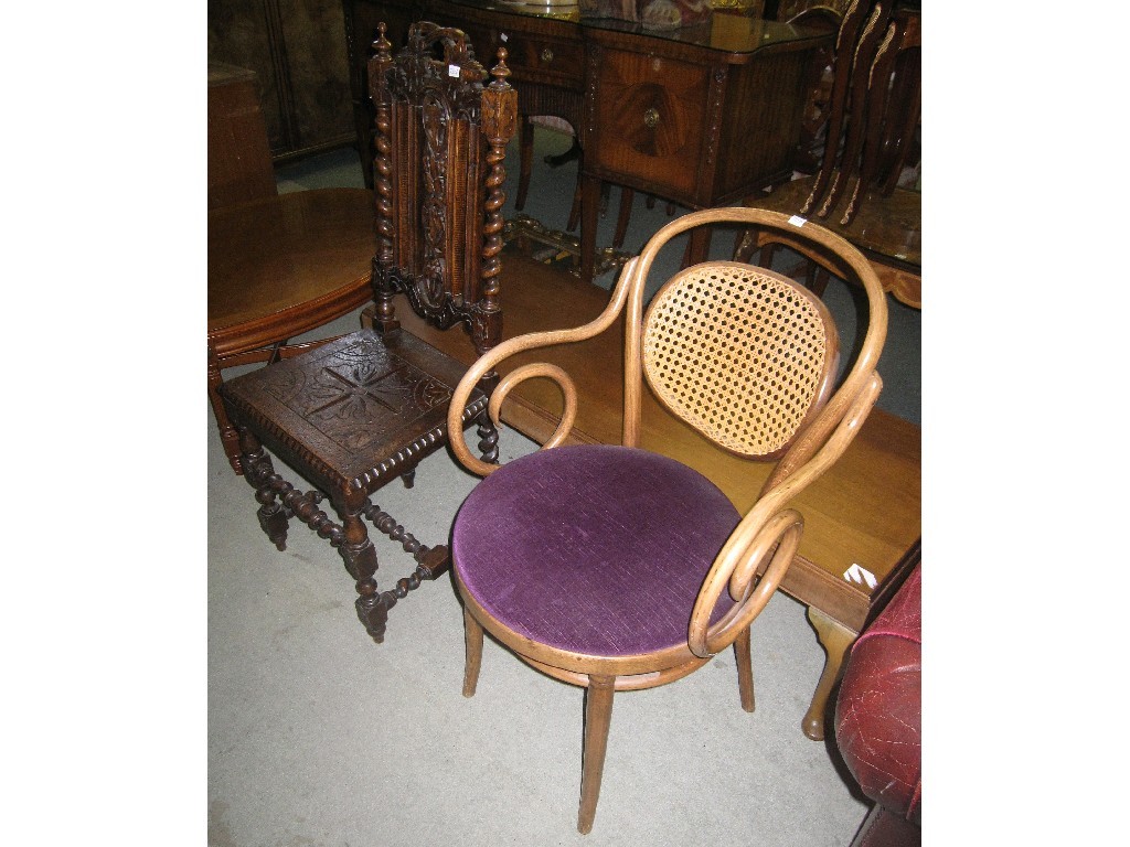 Appraisal: Lot comprising Bentwood armchair and a carved oak hall chair