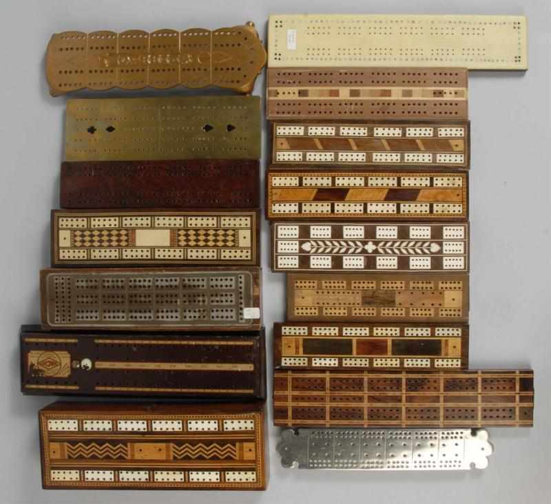 Appraisal: Lot of Metal Wood Cribbage Boards Description Average overall wear