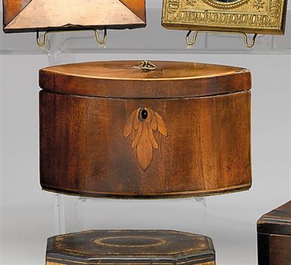 Appraisal: Inlaid mahogany tea caddy th century Of elliptical form retains