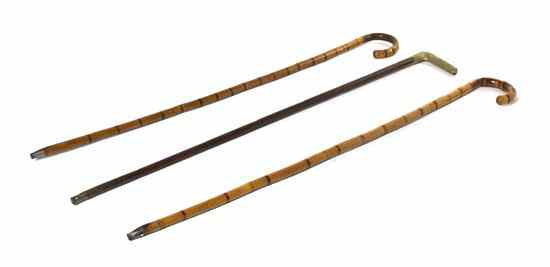 Appraisal: A Group of Three Canes comprising a collapsible faux bamboo