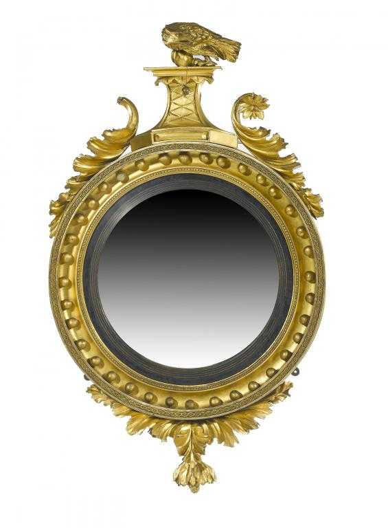 Appraisal: AN EARLY VICTORIAN GILTWOOD AND COMPOSITION MIRROR the convex mirror