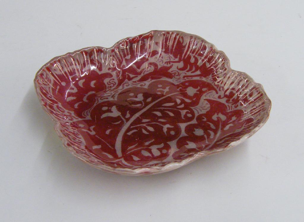 Appraisal: Wedgwood red lustre square shaped dish attributed to William De