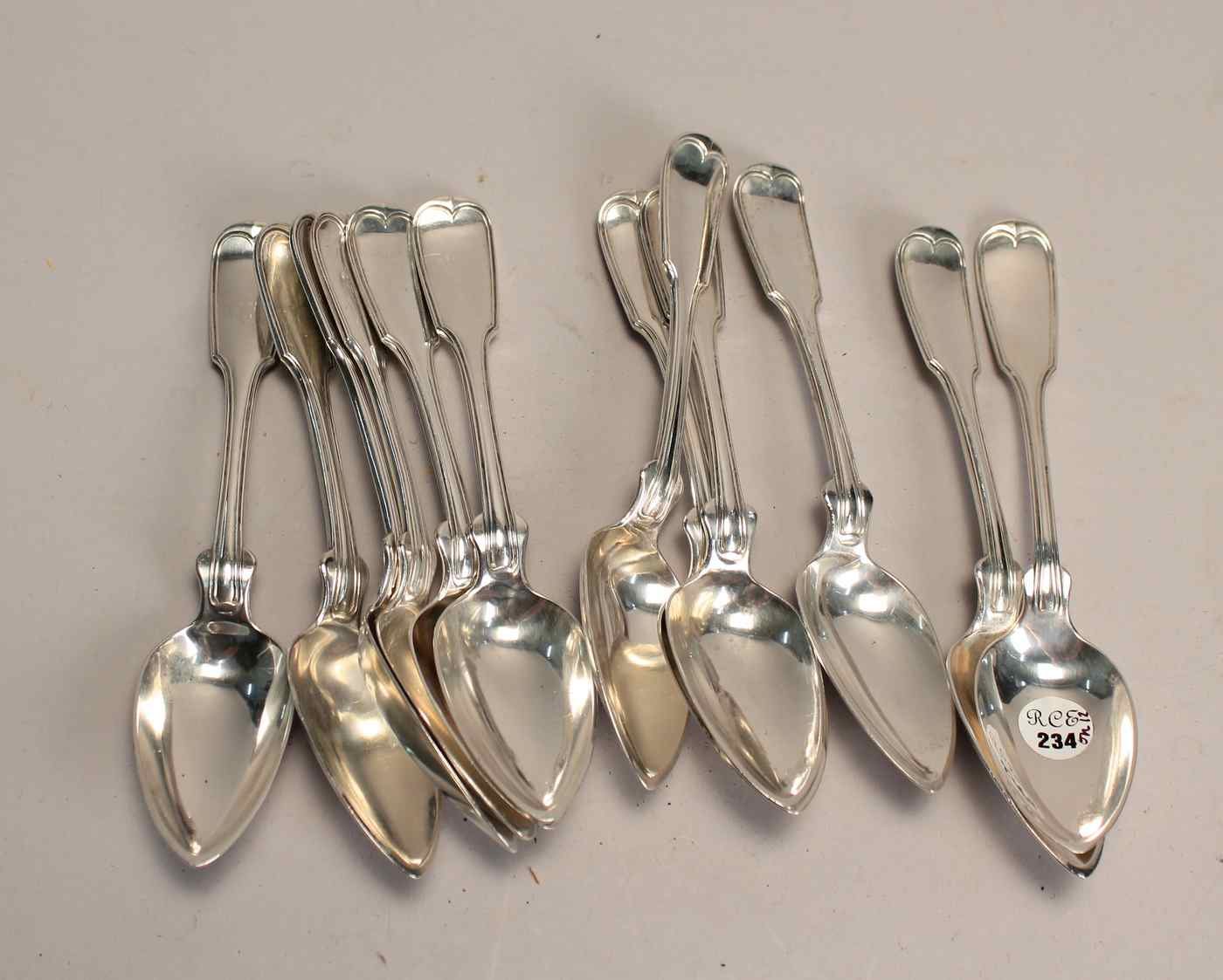 Appraisal: TWELVE AMERICAN SILVER PLACE SPOONSIn the Threaded Fiddle'' pattern Monogrammed