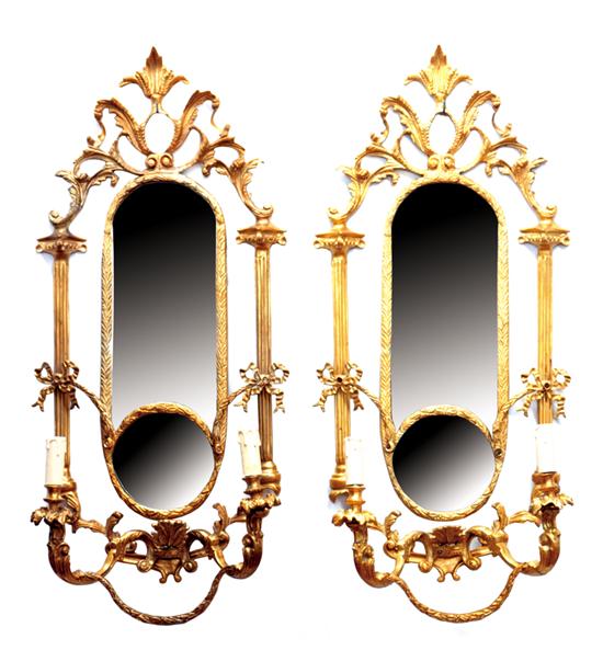 Appraisal: Pair Adam style mirrored sconces cast-brass frame with rococo foliate