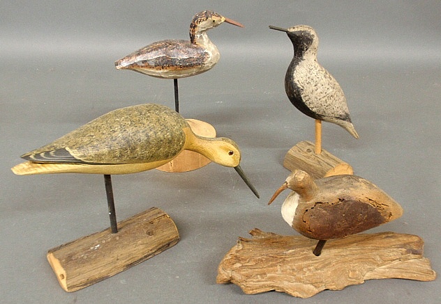 Appraisal: - Four carved shore birds one signed indistinctly largest h