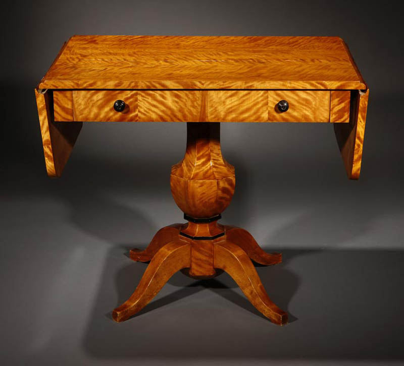 Appraisal: A Biedermeier satin birch sofa table A Biedermeier satin birch