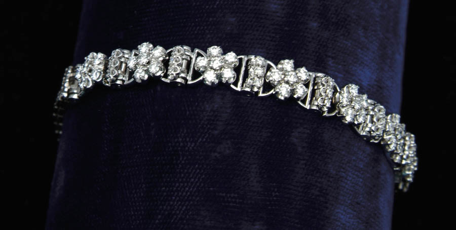 Appraisal: DIAMOND BRACELET Beautiful white gold bracelet has diamond encrusted floral