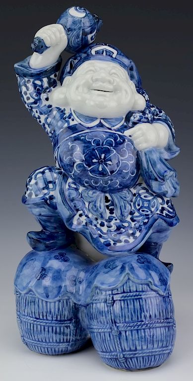 Appraisal: Chinese Export Porcelain Blue White Drummer Statue Crafted of white