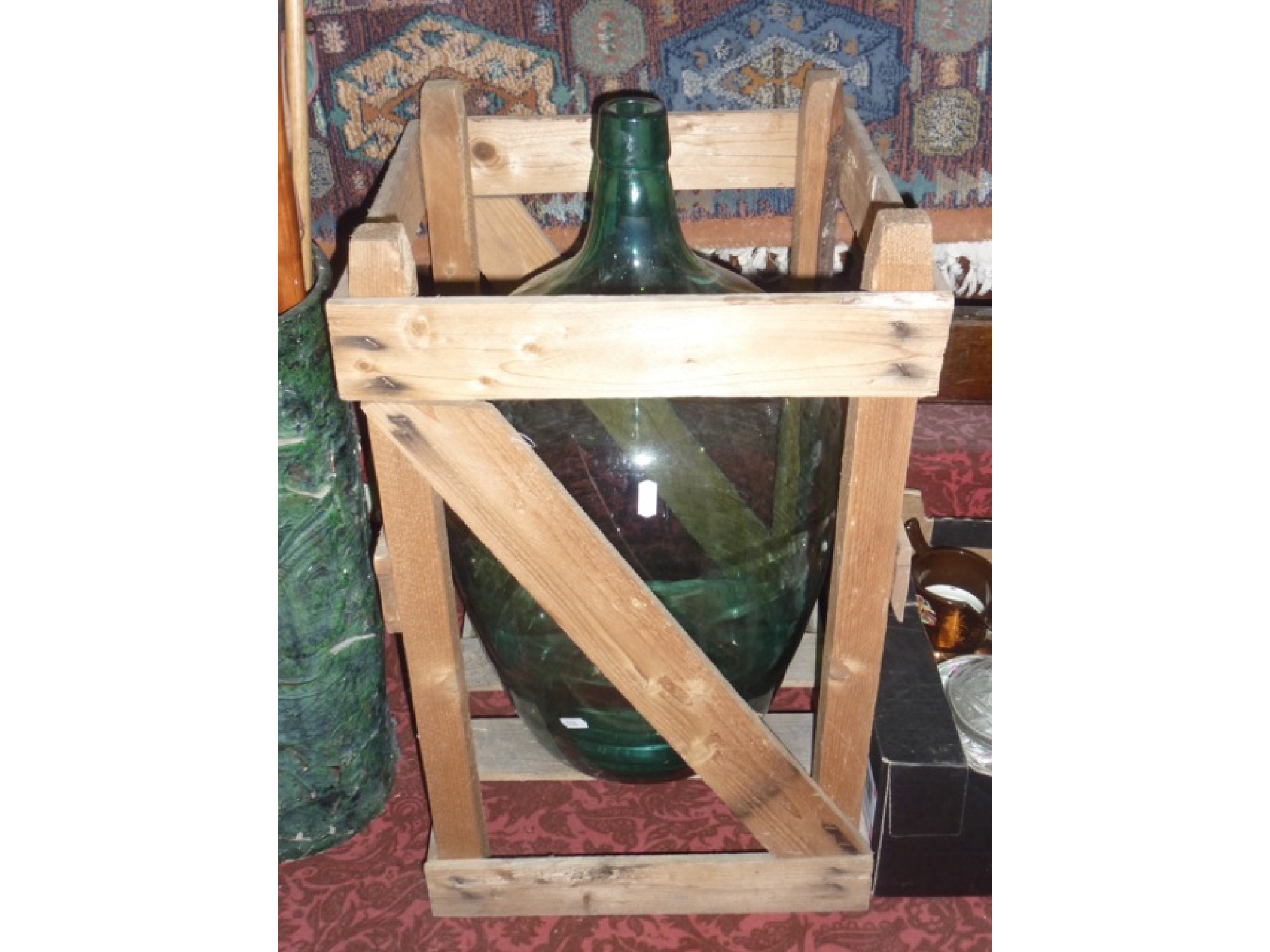 Appraisal: A large blue glass bottle carboy of tapering baluster form