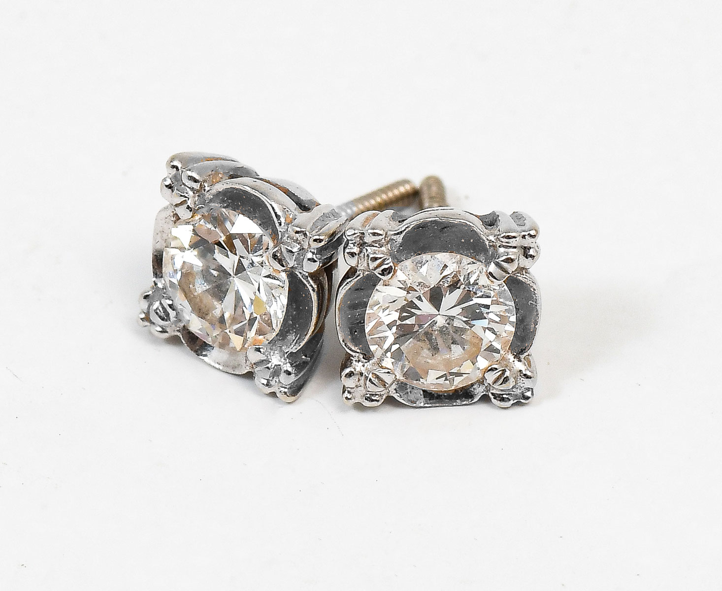 Appraisal: K CTW DIAMOND SOLITAIRE EARRINGS K white gold earrings contain