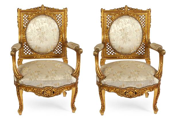 Appraisal: A pair of Louis XVI style gilt armchairs height in