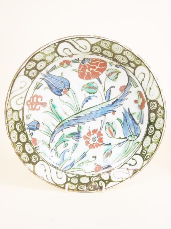 Appraisal: A th th Century Iznik pottery Dish decorated stylised flowers