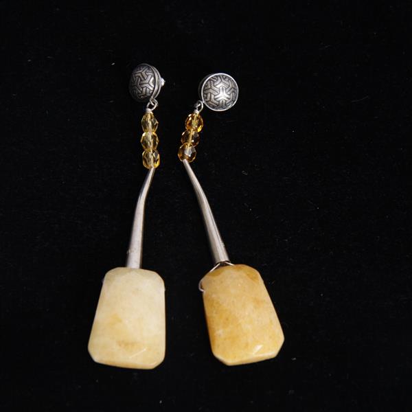 Appraisal: Pair Native American Sterling Silver and Polished Yellow Calcite stone