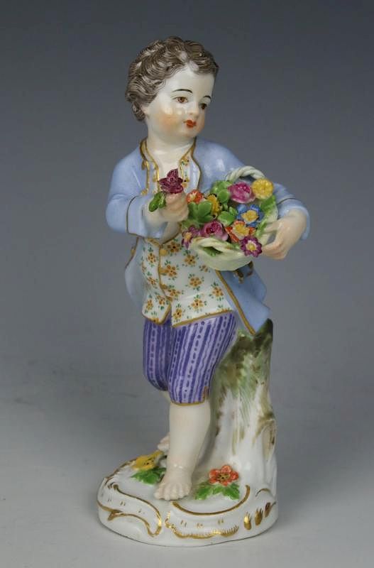 Appraisal: Meissen Kaendler Figurine Boy With Flower Basket MANUFACTURE Meissen GERMANY