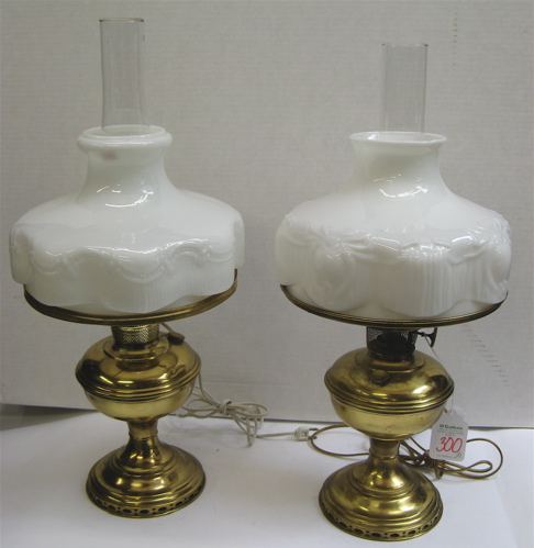 Appraisal: TWO AMERICAN BRASS AND GLASS TABLE LAMPS Originally oil lamps