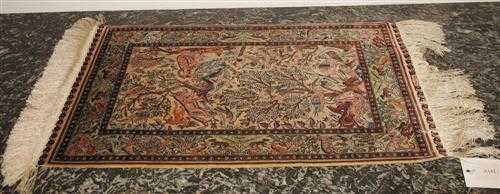 Appraisal: SMALL HEREKE fine Beige central field with colourful animals and