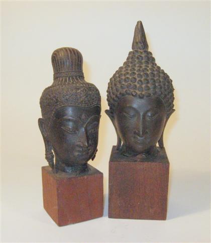 Appraisal: Two Southeast Asian bronze Buddhist headsThe first a Thai head