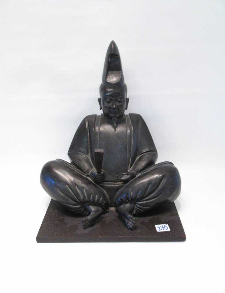 Appraisal: CHINESE PATINATED BRONZE FIGURAL SCULPTURE depicting a seated scholar with