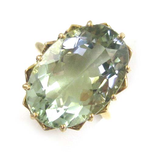 Appraisal: GREEN BERYL AND FOURTEEN KARAT GOLD RING set with a