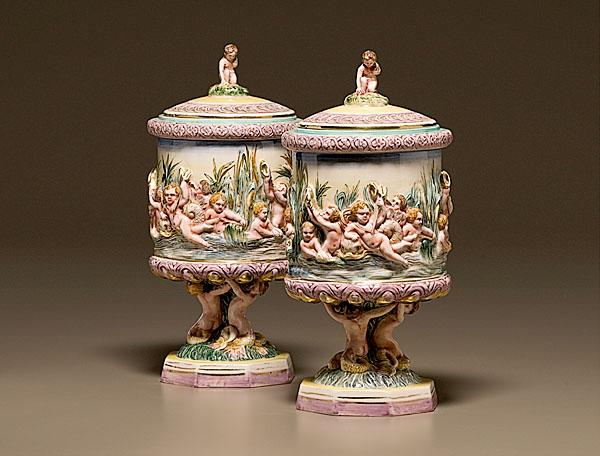 Appraisal: PAIR OF ITALIAN CAPO-DI-MONTE URNS Continental early th century Of