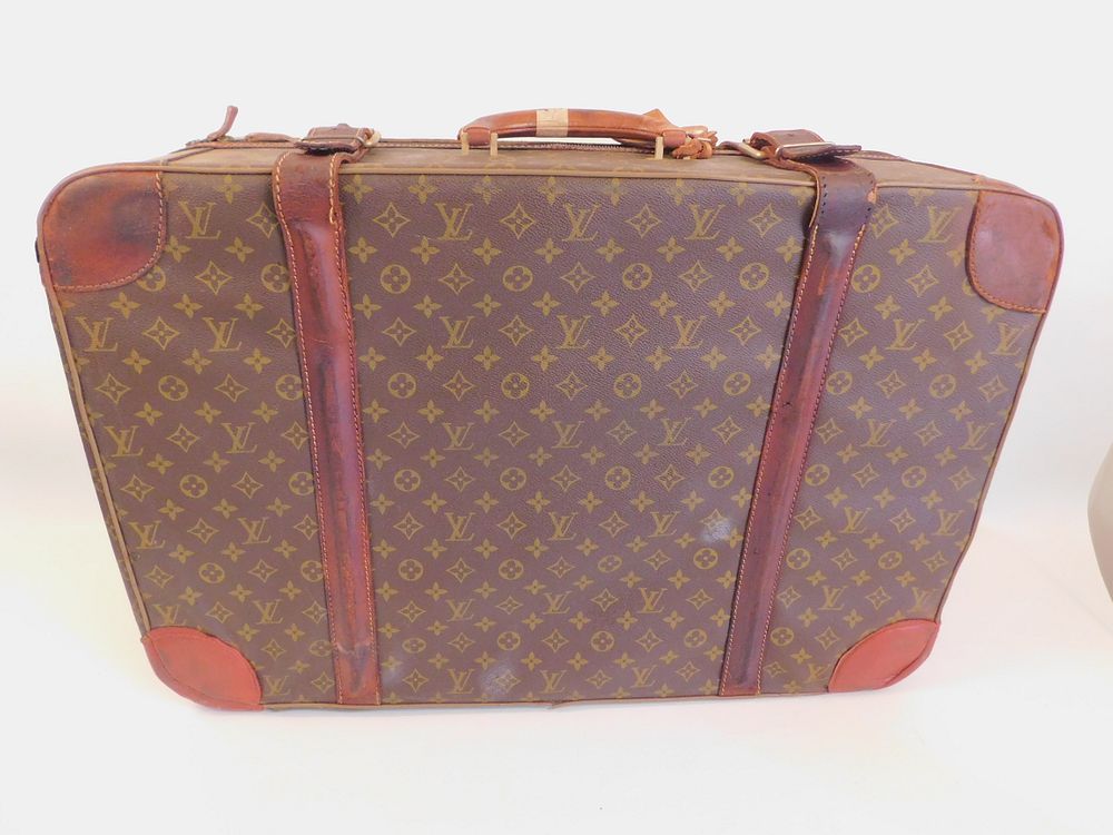 Appraisal: LOUIS VUITTON SUITCASE Old Louis Vuitton logo small suitcase wear