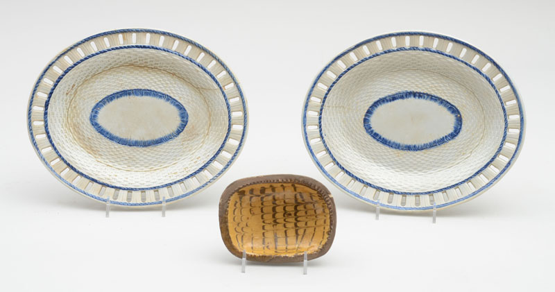 Appraisal: Pair of English Pearlware Oval Stands Each basketweave surface within