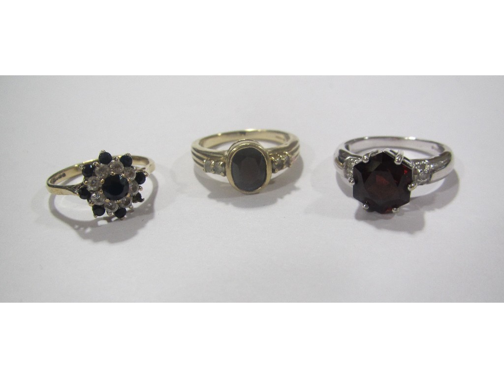 Appraisal: Three ct gold dress rings two with garnet and one