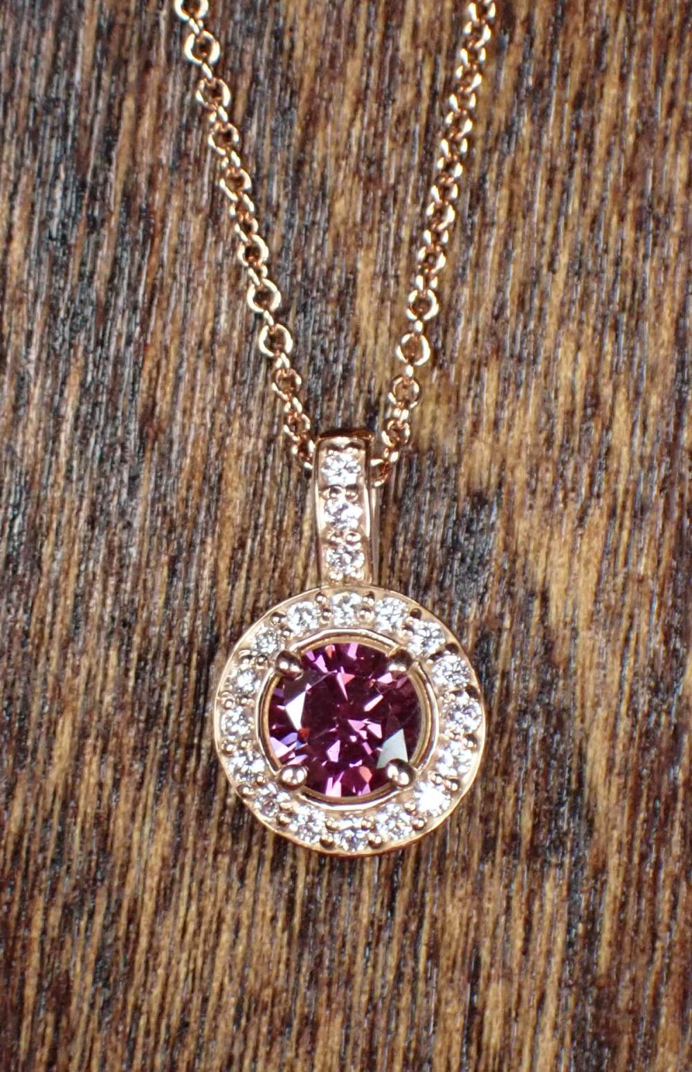 Appraisal: FANCY PURPLISH PINK DIAMOND PENDANT NECKLACE with a k rose