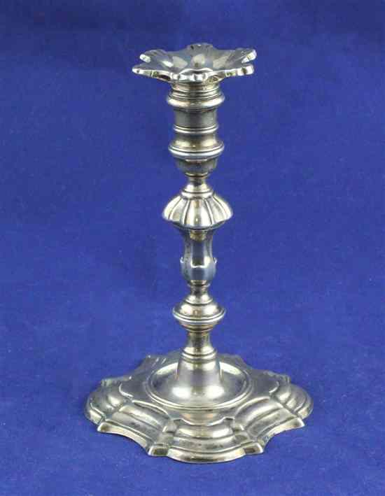 Appraisal: A George II silver taperstick with turned stem William Gould