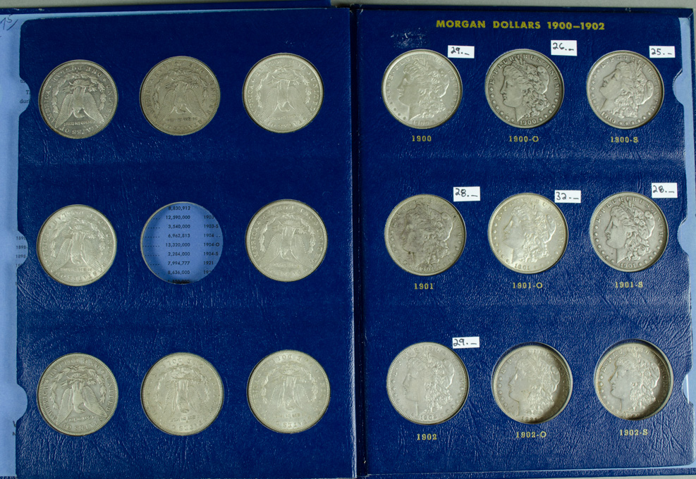 Appraisal: TWENTY-ONE U S SILVER MORGAN DOLLARS IN ALBUM - including