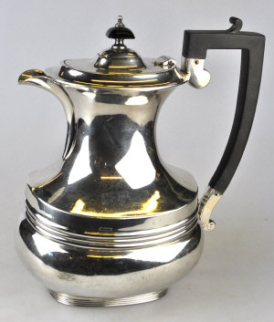 Appraisal: A silver hot water jug of oblong baluster form Jay