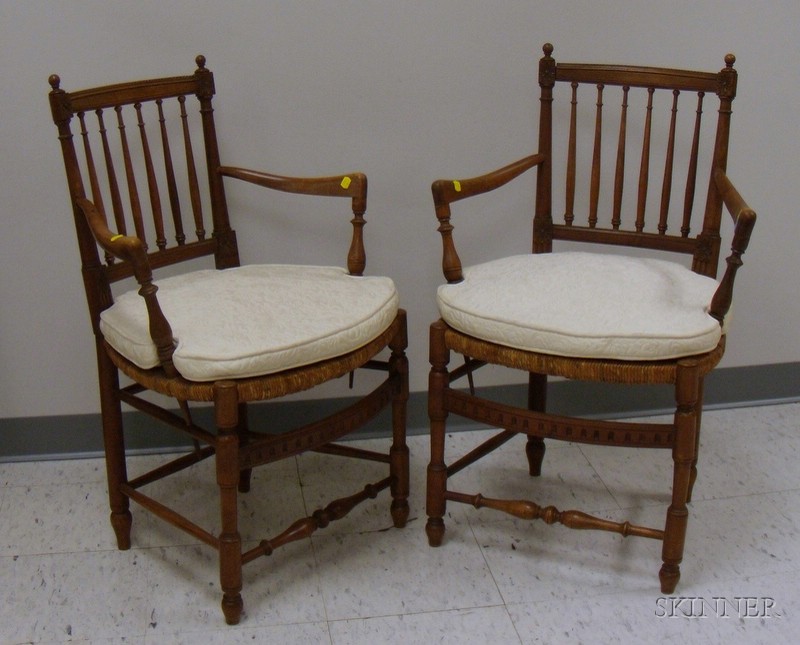 Appraisal: Pair of French Carved Walnut Armchairs with Woven Rush Seats