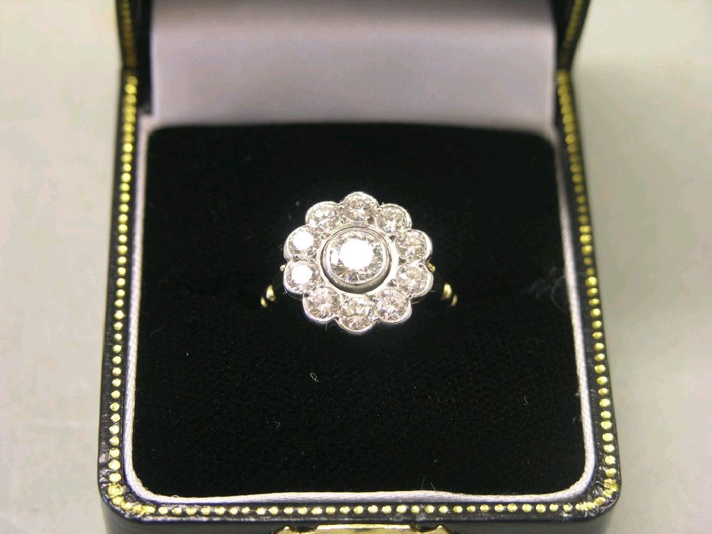 Appraisal: An ct gold and diamond cluster ring principal stone approximately