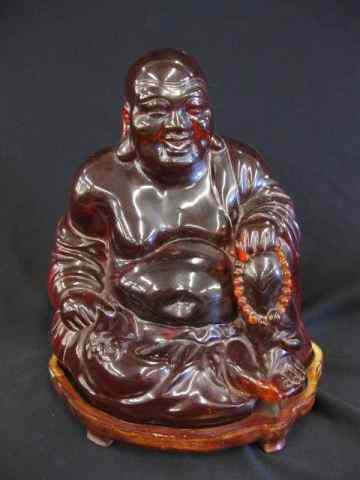 Appraisal: Carved Cherry Amber Figurine of a SeatedBuddha '' tall on