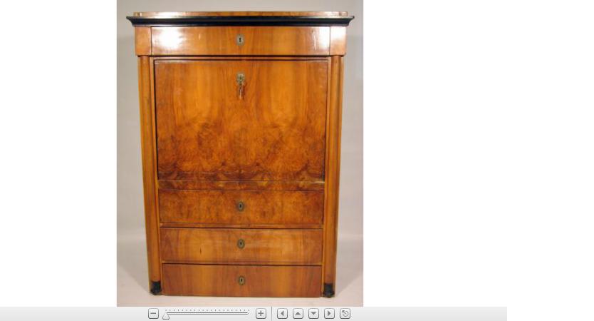 Appraisal: Biedermeier walnut and ebonized secretaire The molded ebonized cornice over