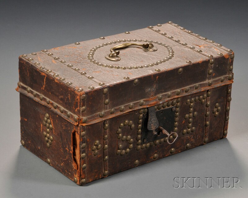 Appraisal: Brass-tack-decorated Hide-covered Trunk Lined with Eagle Wallpaper America early th