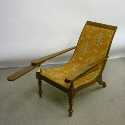 Appraisal: A VICTORIAN COLONIAL TEA PLANTER'S CHAIR now upholstered in woven