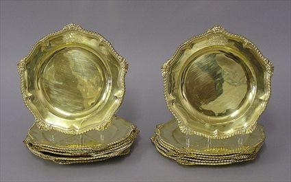 Appraisal: SET OF TWELVE GEORGE III-STYLE SILVER-GILT ARMORIAL PLATES Impressed Sterling