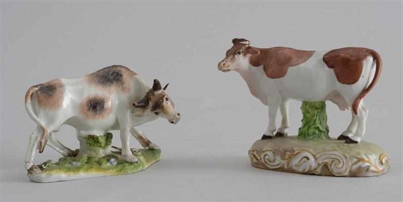 Appraisal: TWO CONTINENTAL PORCELAIN FIGURES OF COWS One brown-spotted with underglaze