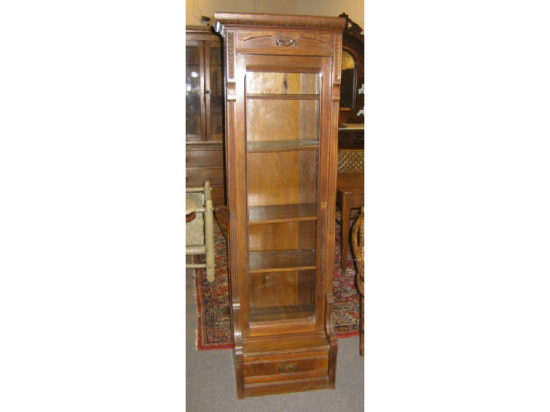 Appraisal: PAIR OF AMERICAN TH CENTURY WALNUT BOOKCASES Each with a