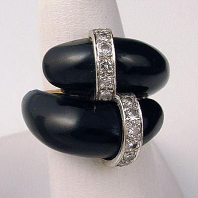 Appraisal: K ONYX AND CTW DIAMOND RING K yellow gold ring